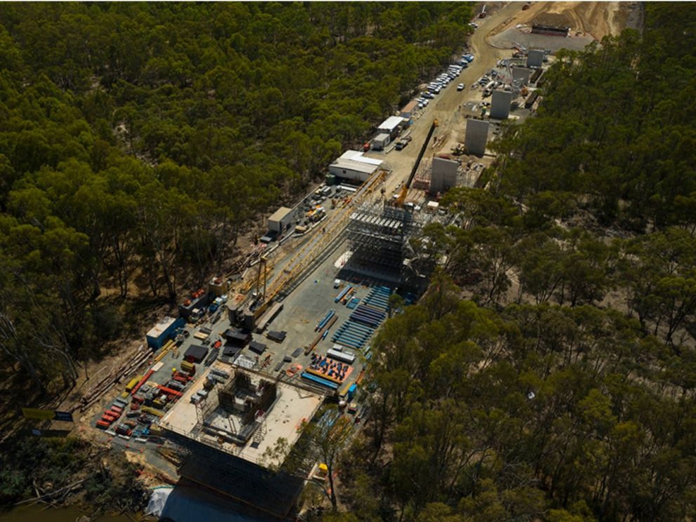 Birds eye image of the pier construction surrounded by nature on either side of the works