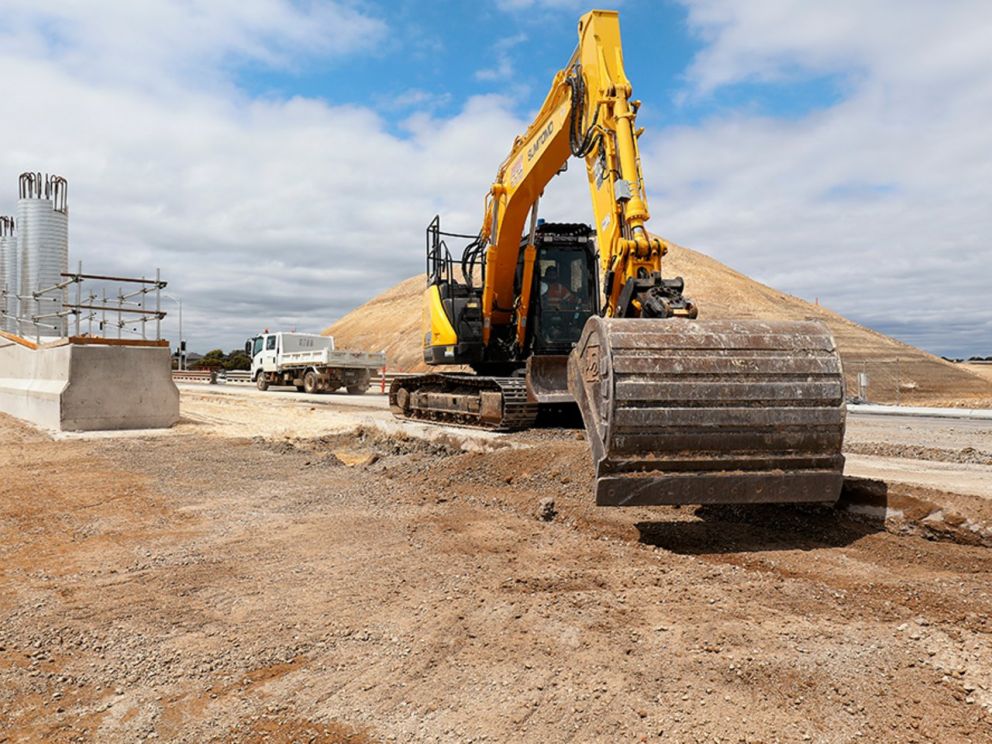 Continuing to build the new median on Governor Road