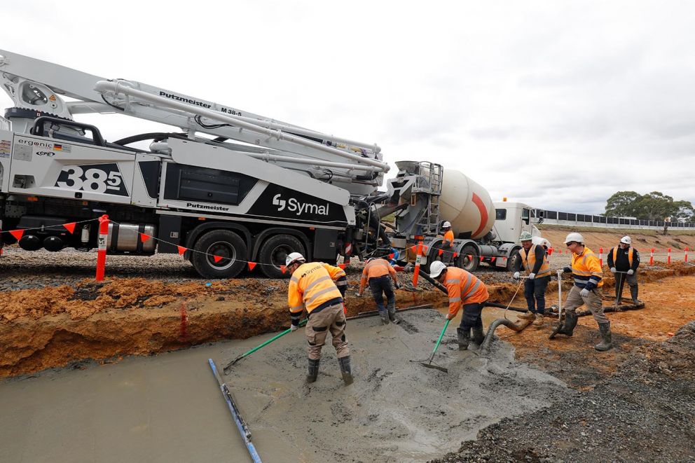 'Blinding' the base layer of concrete to provide a clean, level and dry working surface