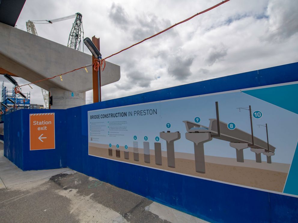 A sign at Preston Station with information showing the bridge construction process.
