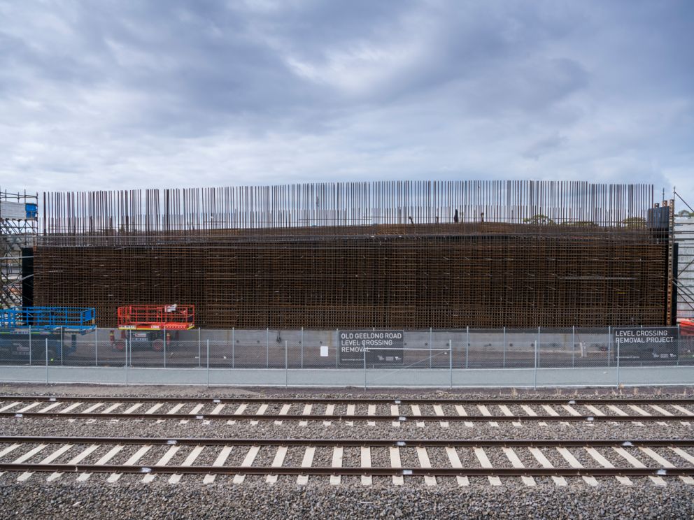 Metal wall along the rail corridor 