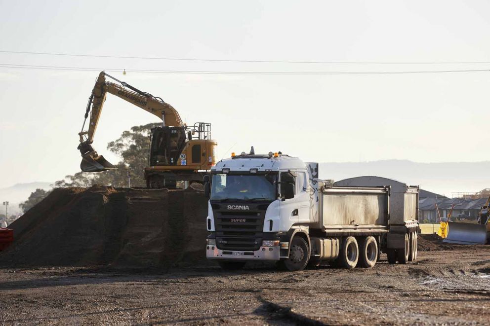 Stockpiling material to build the expanded intersections