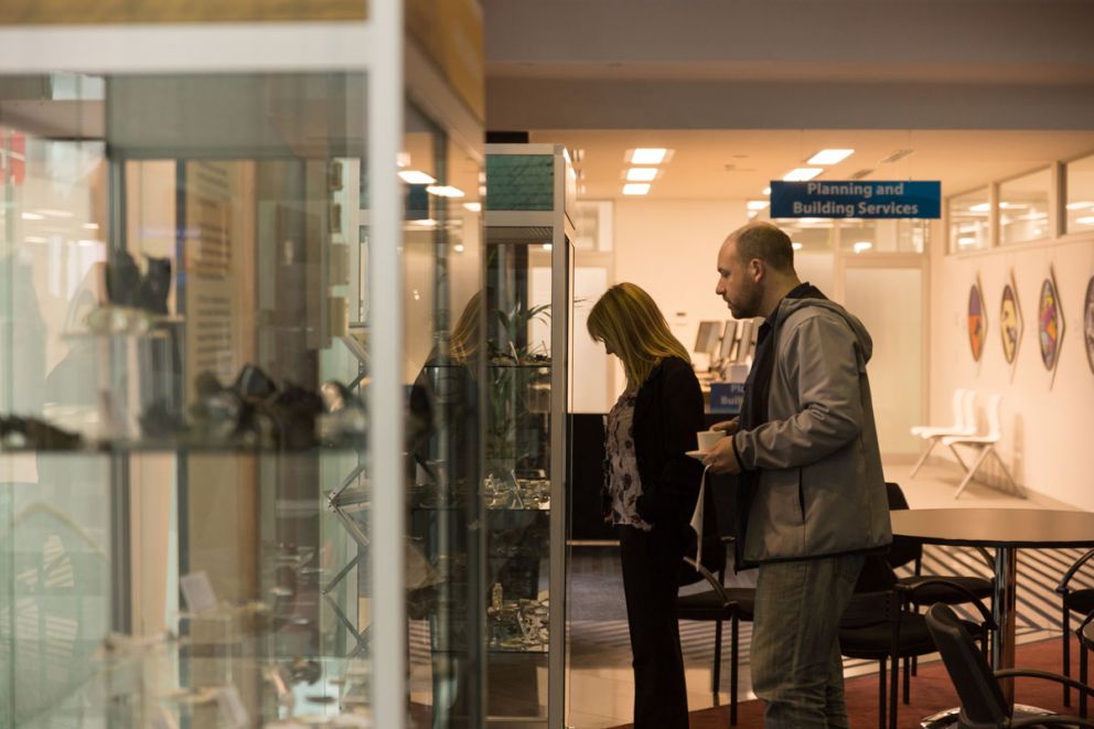 People looking at display
