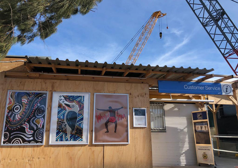 3 pieces of artwork on temporary station