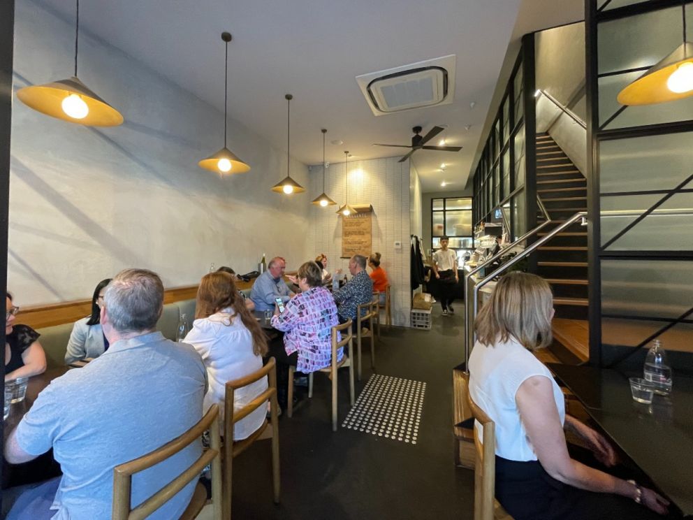 Downstairs of restaurant filled with diners