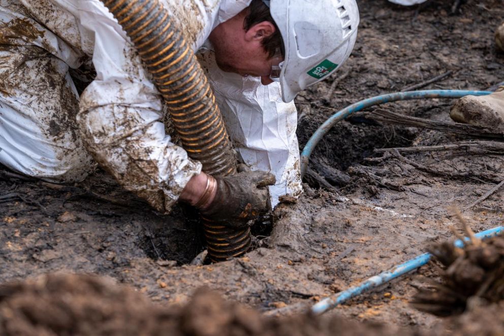 Teams work to install a temporary water supply to Bogong Village