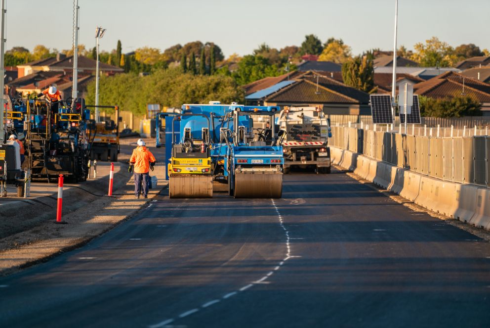 Machinery ready to roll the finishing touches along Calder Park Drive