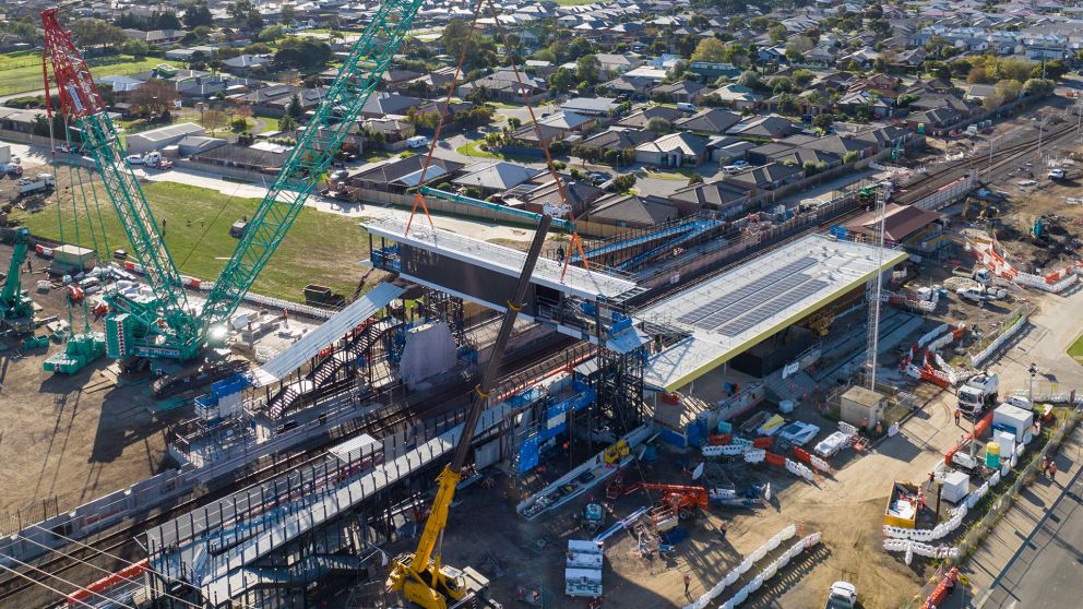 Marshall Station overpass is lifted into place. 