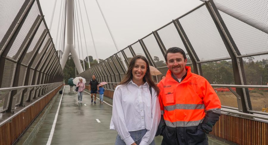 Pedestrians on the Estelle St bridge