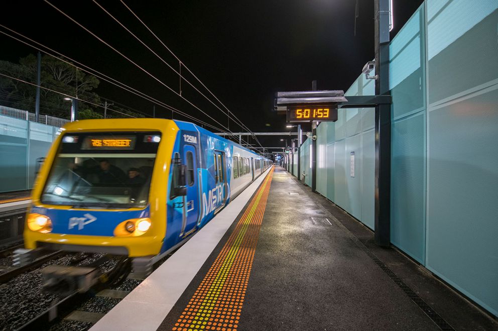 A train departs from Mentone Station as services resume on the Frankston line.