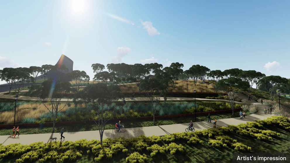 An artist impression of the Yarra Link green bridge showing the southern portal ventilation structure and recreational park users.