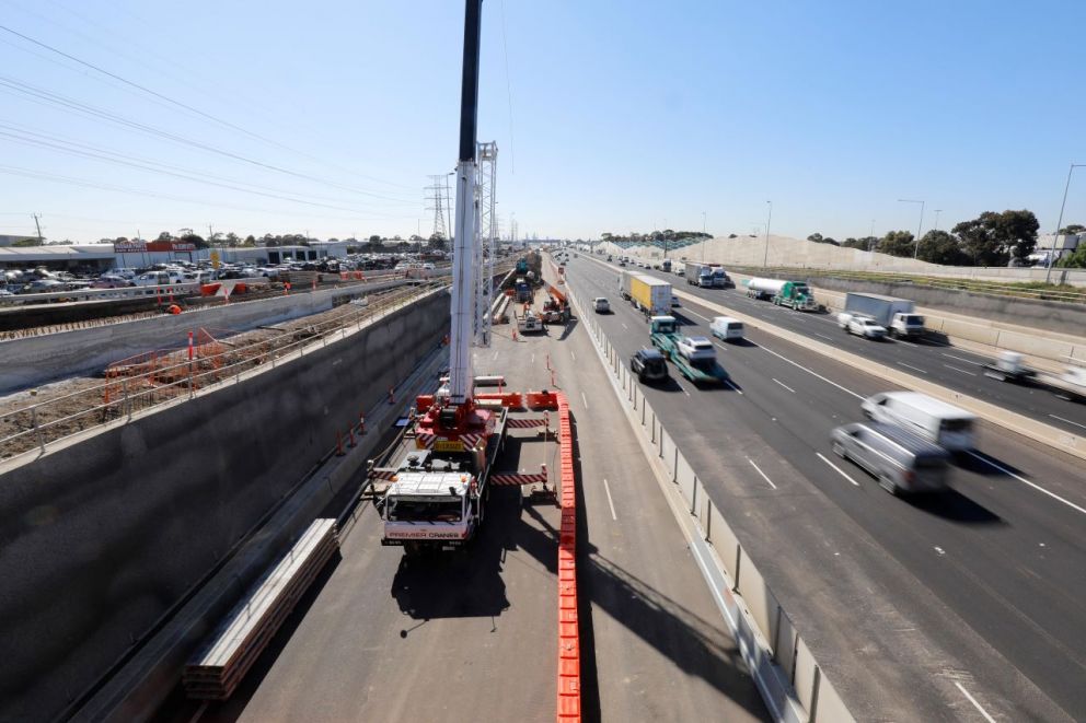 Pavement reconstruction and barrier construction works at Grieve Parade city-bound entry ramp. 