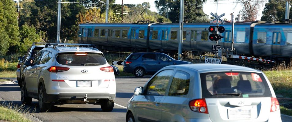 Traffic waiting at the Station Street level crossing in Beaconsfield