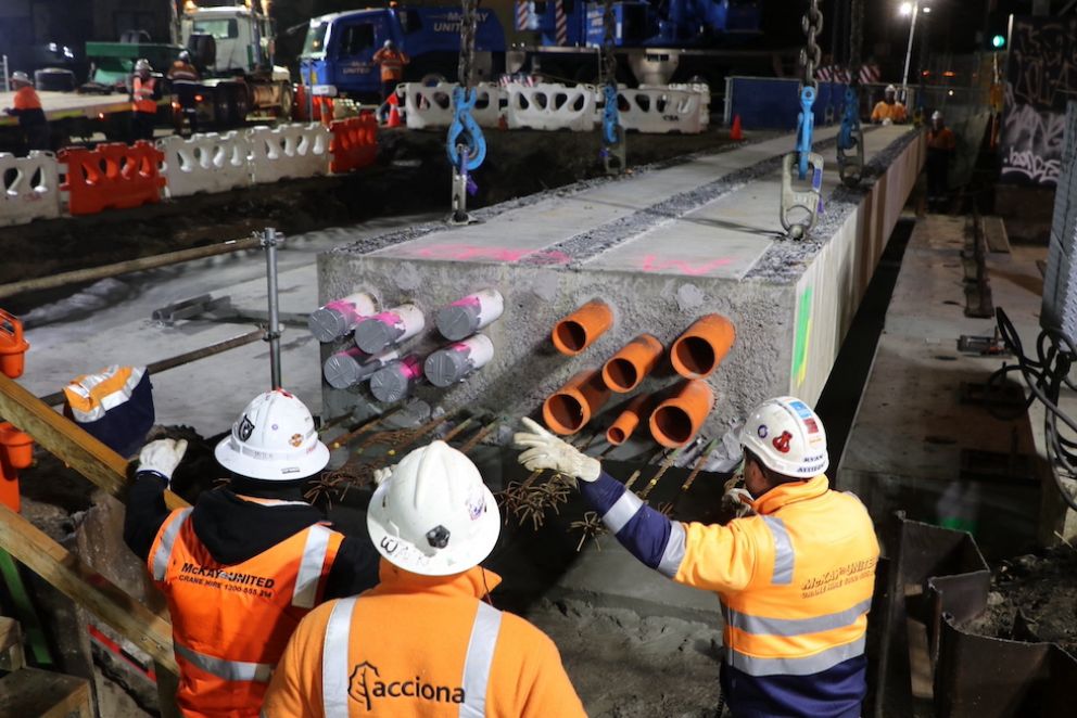 Installation of a 20-metre-long service beam that will form part of the new Neerim Road connection above the lowered line.