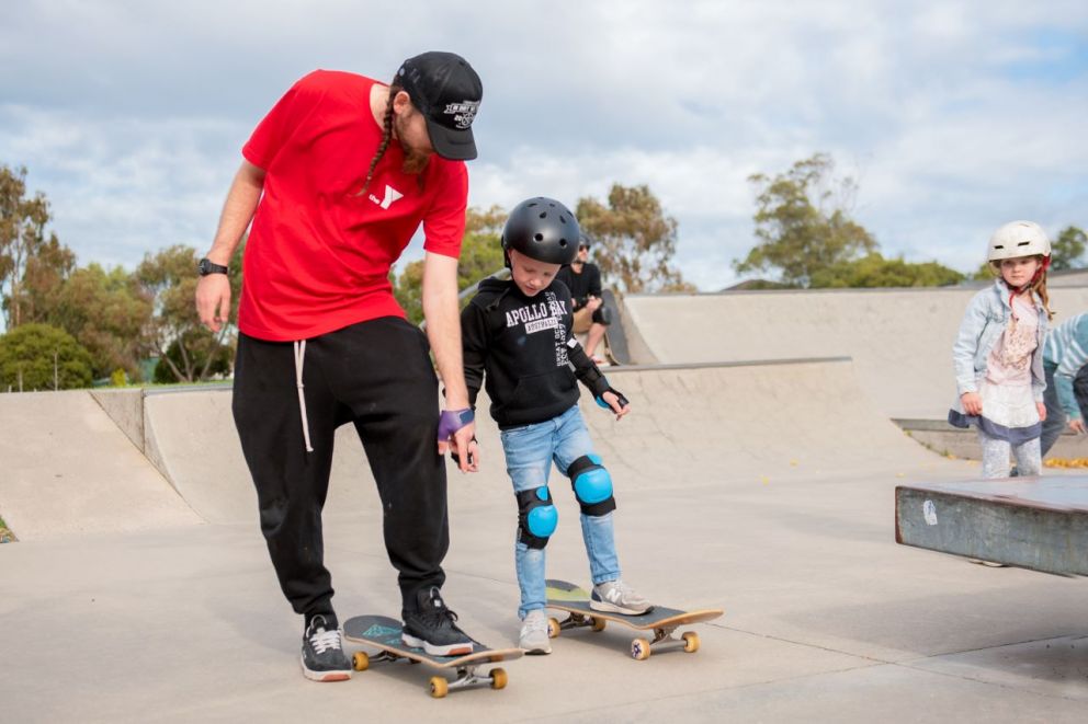 A child learning how to skate at the YMCA All Aboard program.