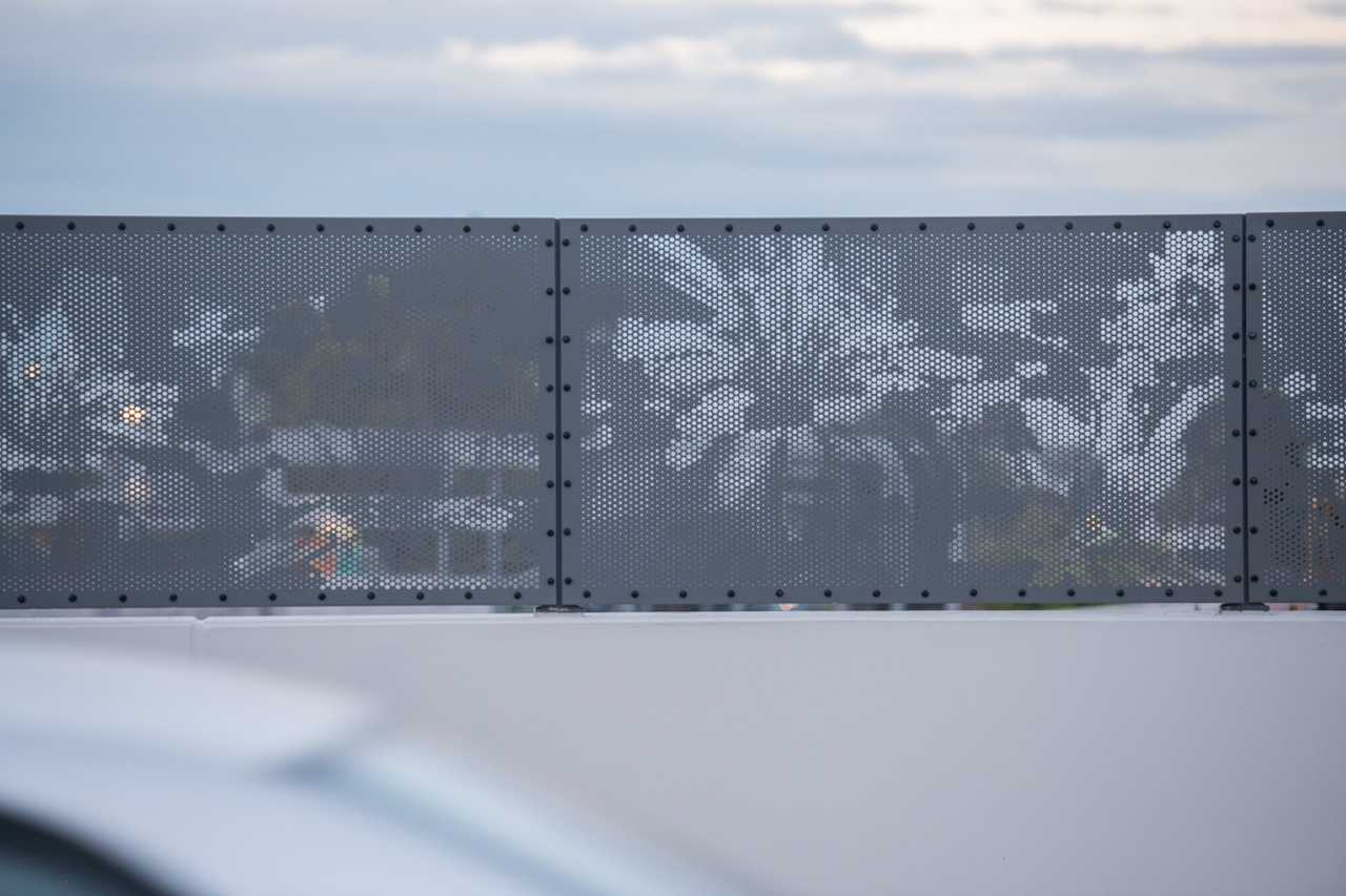 The screening over the Glenroy Road bridge reflecting the Murnong (Yam Dasiy).