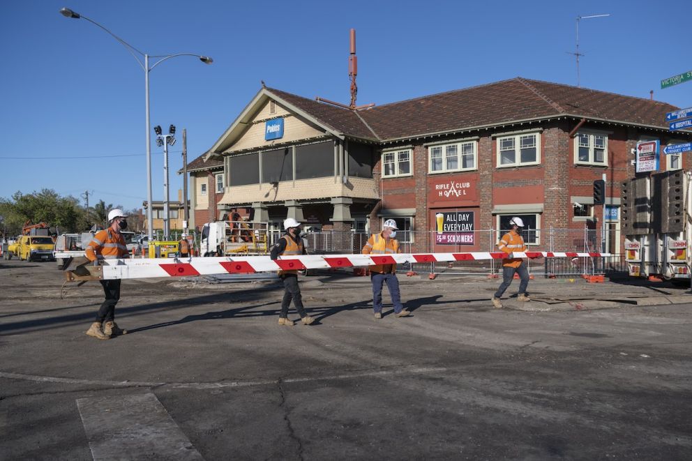 Boom gates being removed at the Ferguson Street level crossing in Williamstown