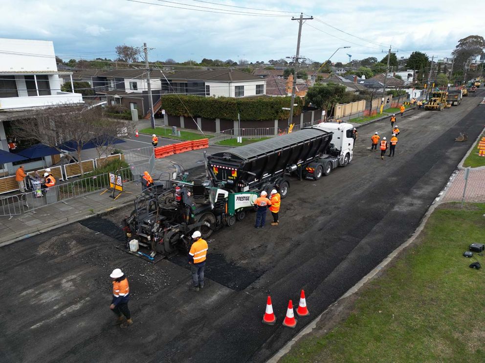 New asphalt being placed on South Road near Holmesglen Hospital