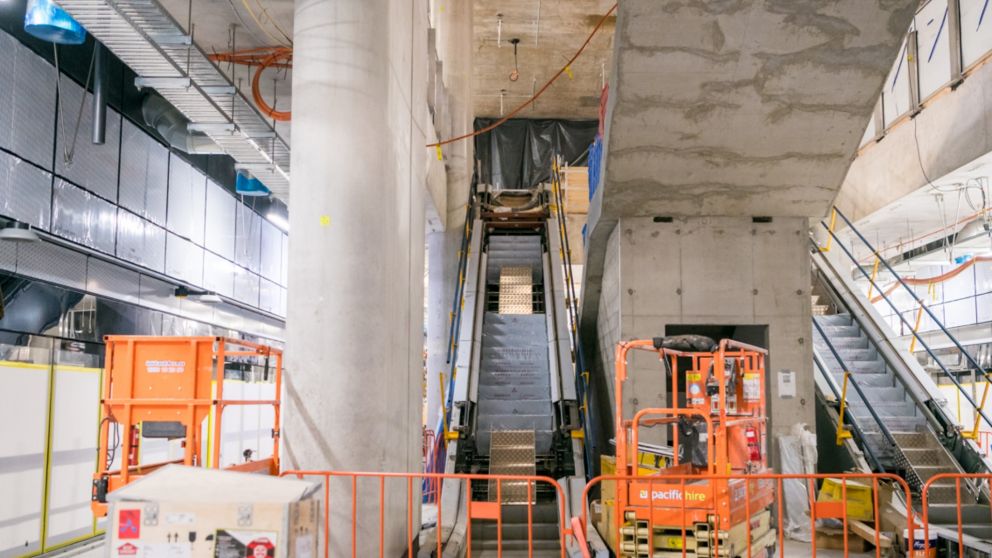 An underground concrete platform with construction equipment on it