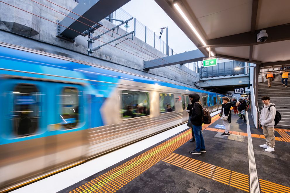 Commuters wait to board at the new Glen Huntly Station