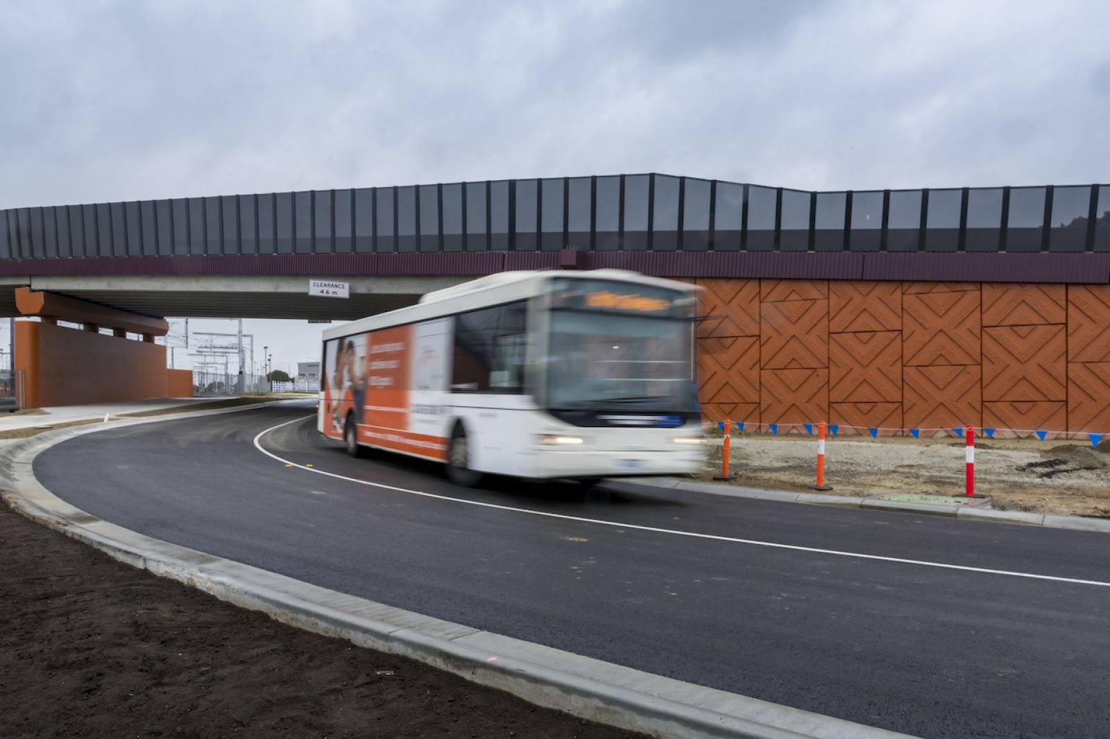 PTV bus travelling under a new road bridge