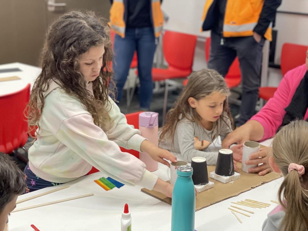 Building bridges with local school students.