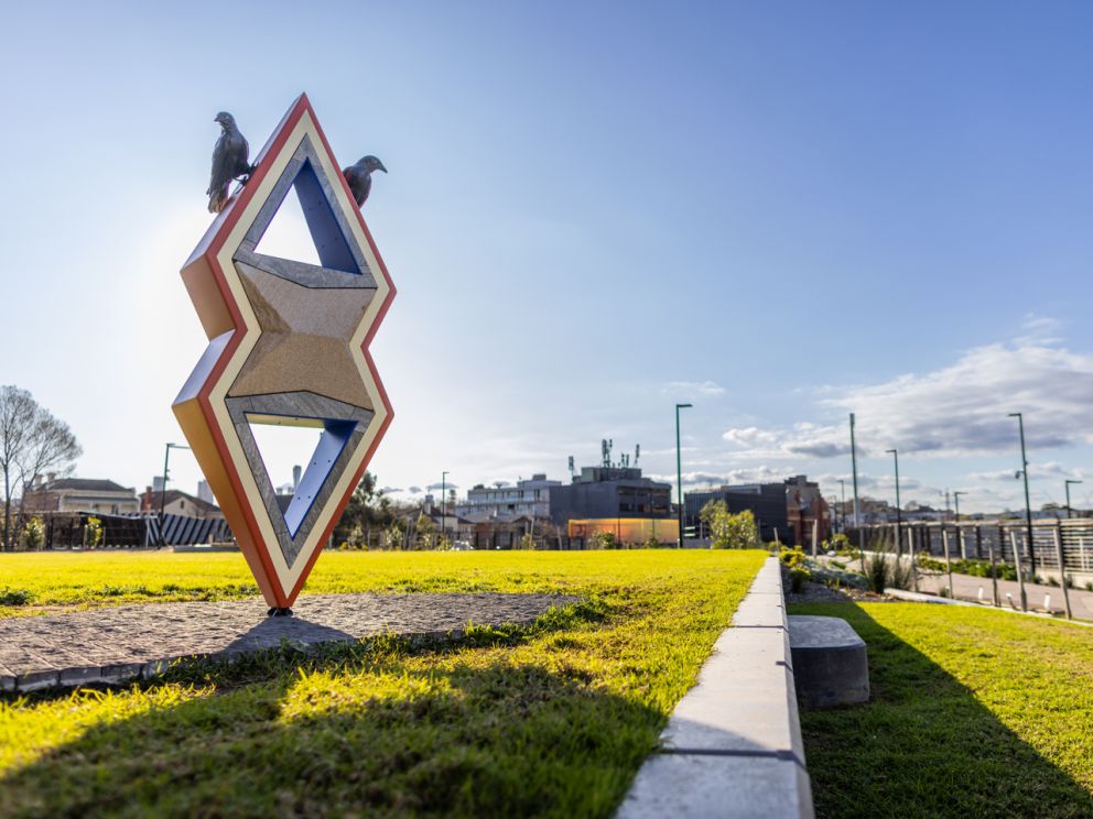 Sculpture artworks at park with green lawn 