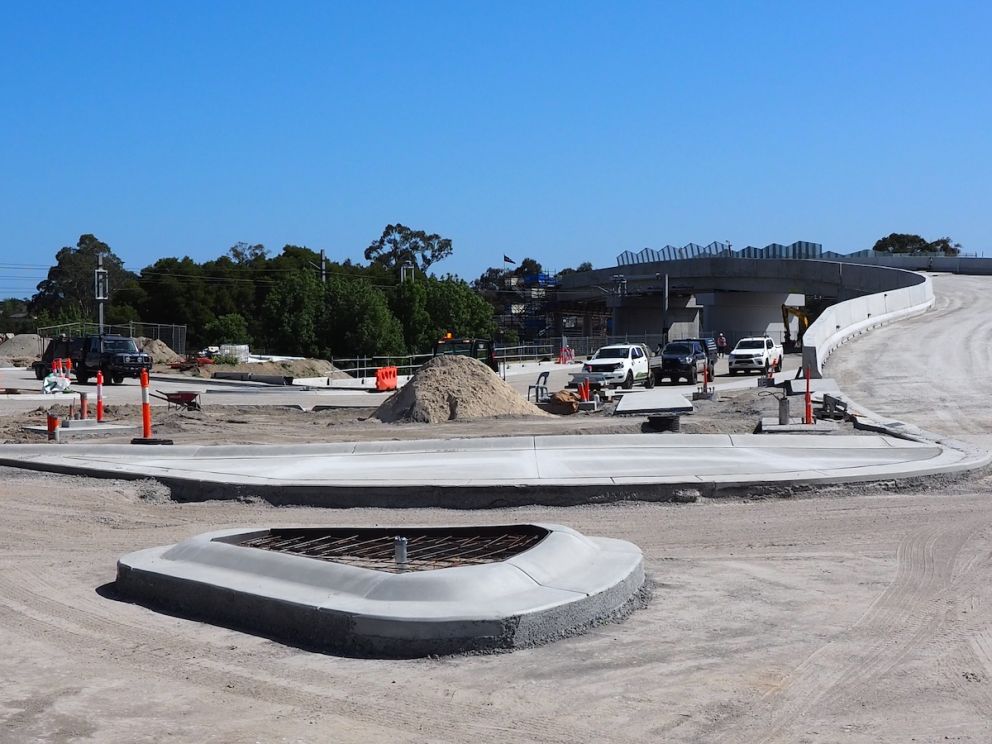 The roundabout connects to the road bridge being built over the rail line