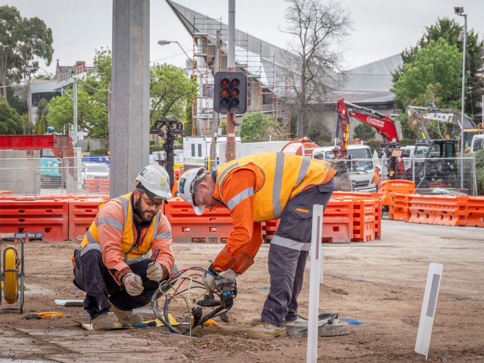 Two crew members working onsite in Clayton.