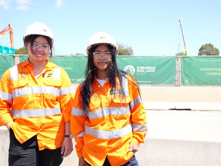 Two female highschool students on a SRLA construction site