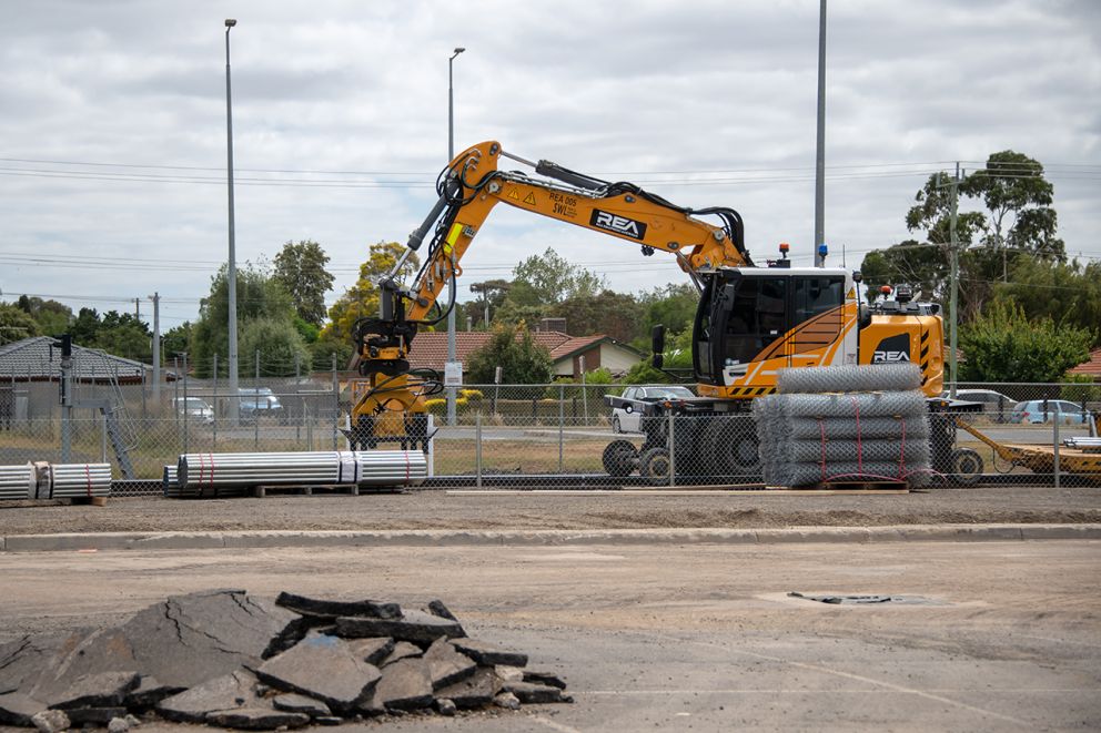 Installing fencing along the rail line