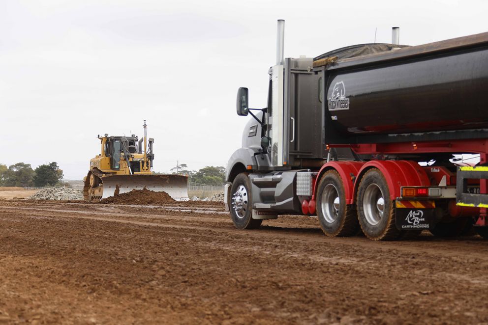 April 2025 - Trucks are bringing in dirt to be spread and compacted to build the foundation for the new road