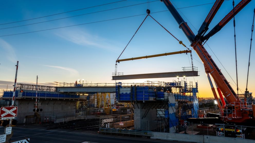 Ferris Road bridge beam being lifted in