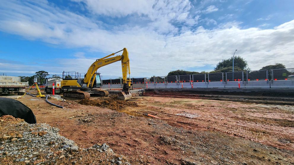 Excavator behind the southbound barriers