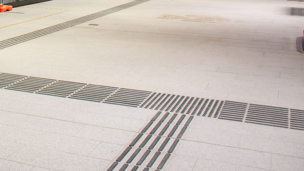 Tactile ground indicators help guide you to key points.