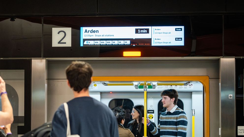 Screens above the doors show live service information and are a bright visual marker to help you find a door.