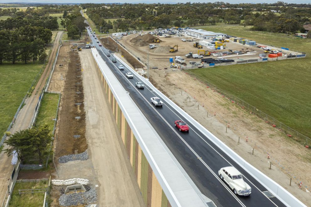 Classic cars travel across the new Watsons Road bridge