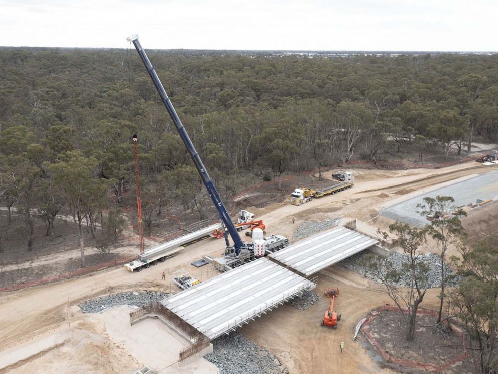 The last of the 125 concrete Super Tee beams installed on the Victorian flood relief bridge