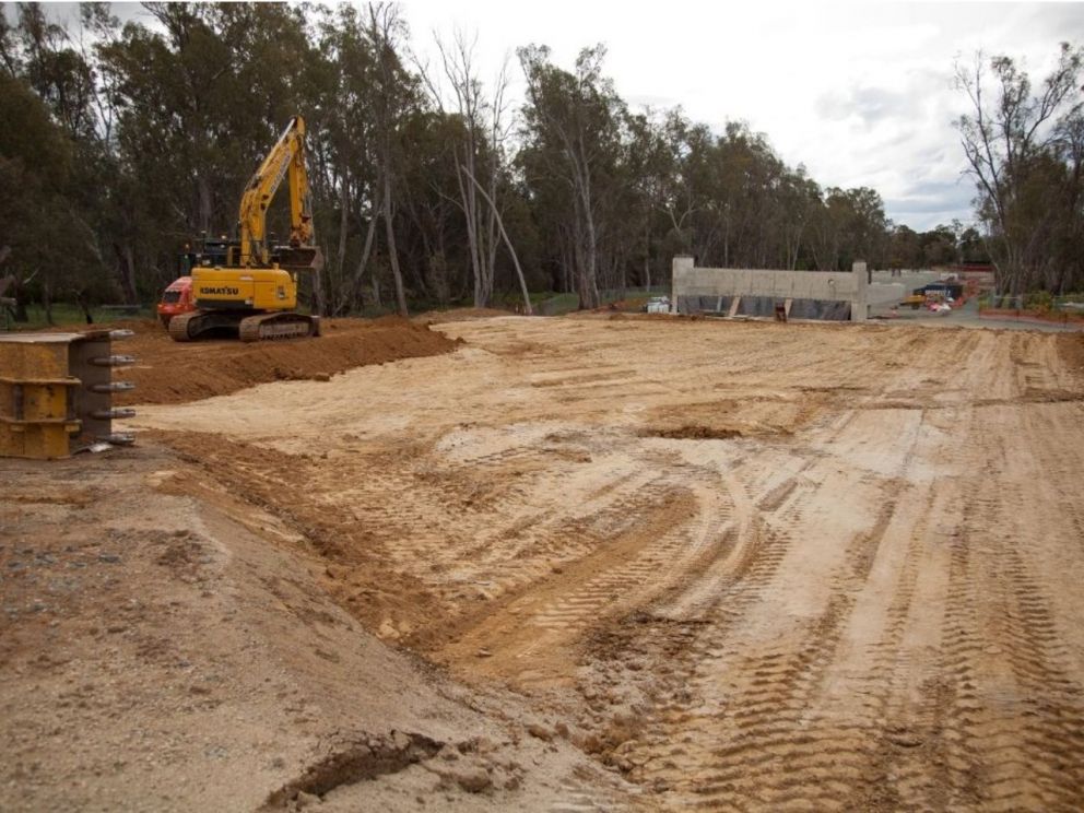 Campaspe River Bridge embankment construction with construction vehicle in the background