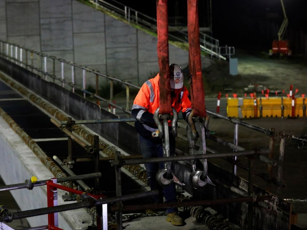 Lifting the beams into place for the bridge over Centre Dandenong Road.