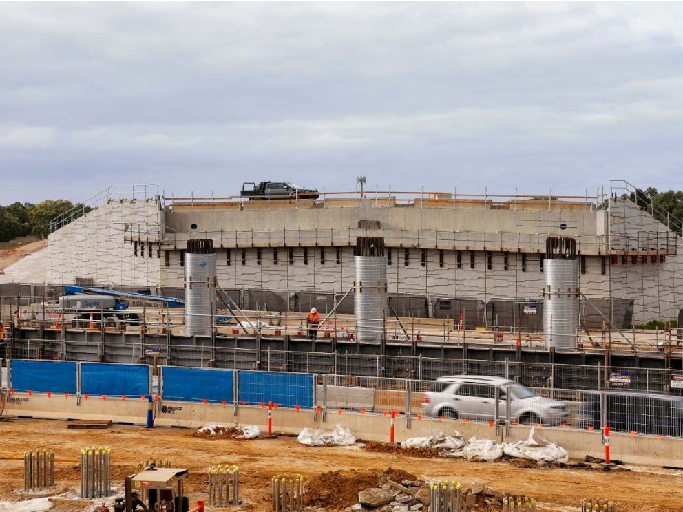 Works to build the bridge supports for the bridge over Lower Dandenong Road.