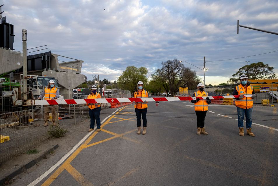 Crews remove the boom gates at Maroondah Highway, Lilydale