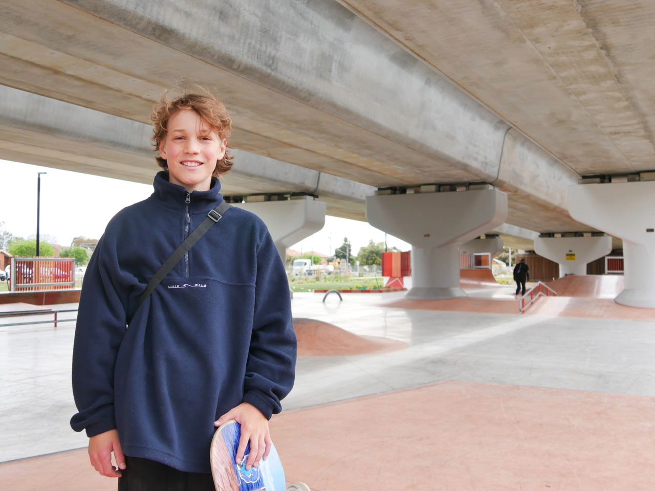 Baker Bitton stands in front of the new Werribee skate park he helped design.