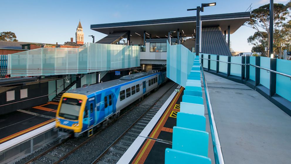 A train arrives at the new Mentone Station