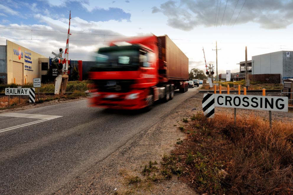 A truck passing through the Abbotts Road level crossing.