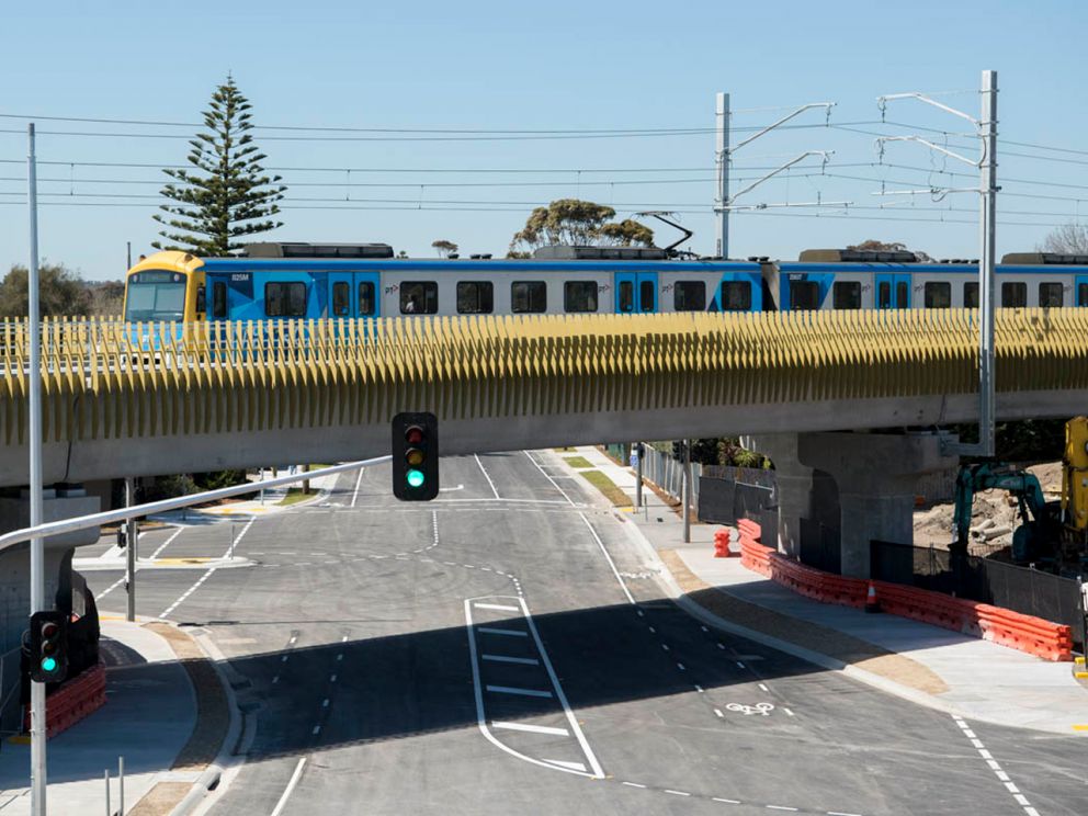 Train passing over Seaford Road on elevated rail.