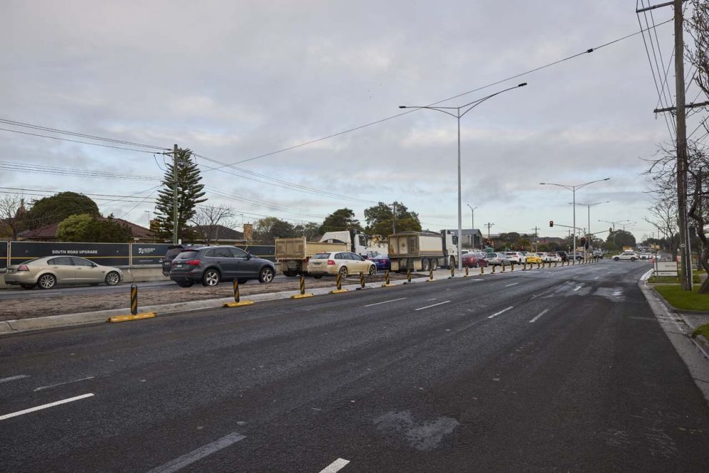 On South Road looking westbound towards East Boundary Road intersection, safety barriers are in place while works are undertaken.