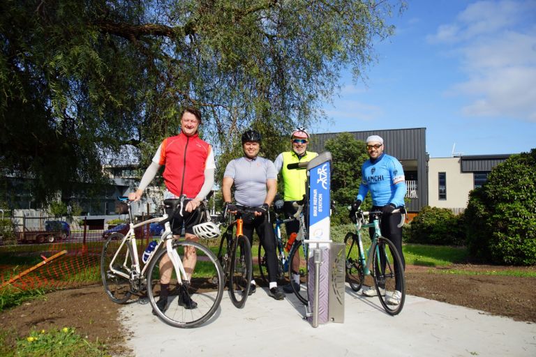 Four cyclists on the new South Road bike path