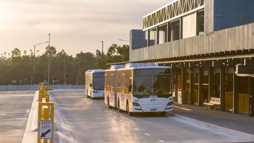 Buses waiting at the new Bulleen Park and Ride ground platform at sunset.