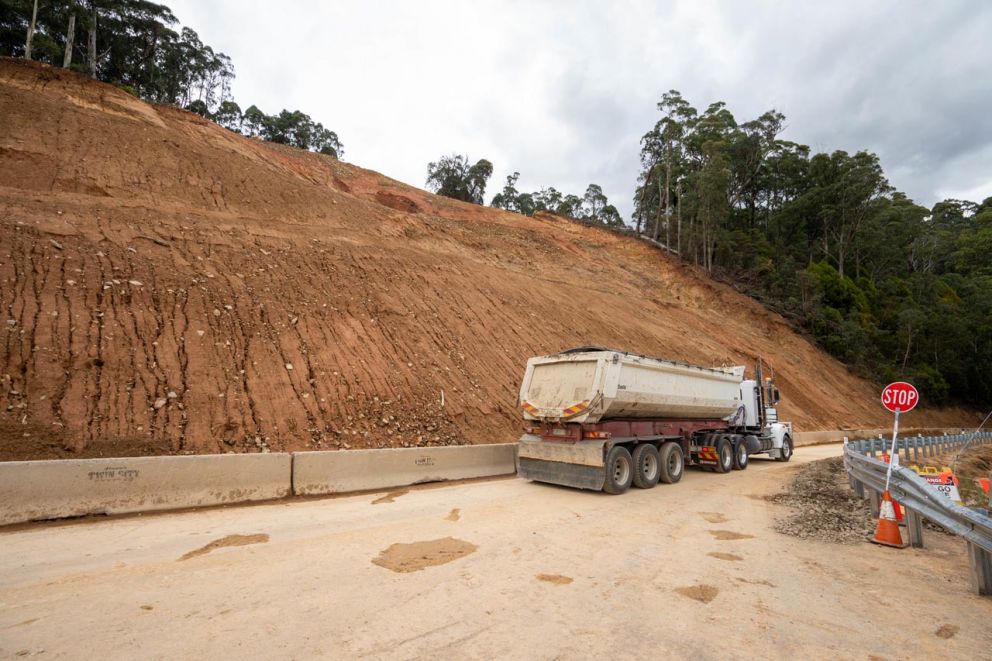 Truck moves material on Bogong High Plains Road in front of the landslip 31 March